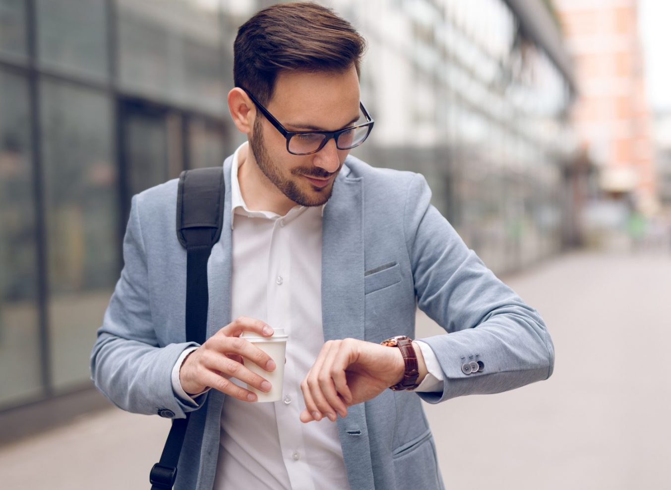 A person checking time representing on time moving service by Rent-a-Son