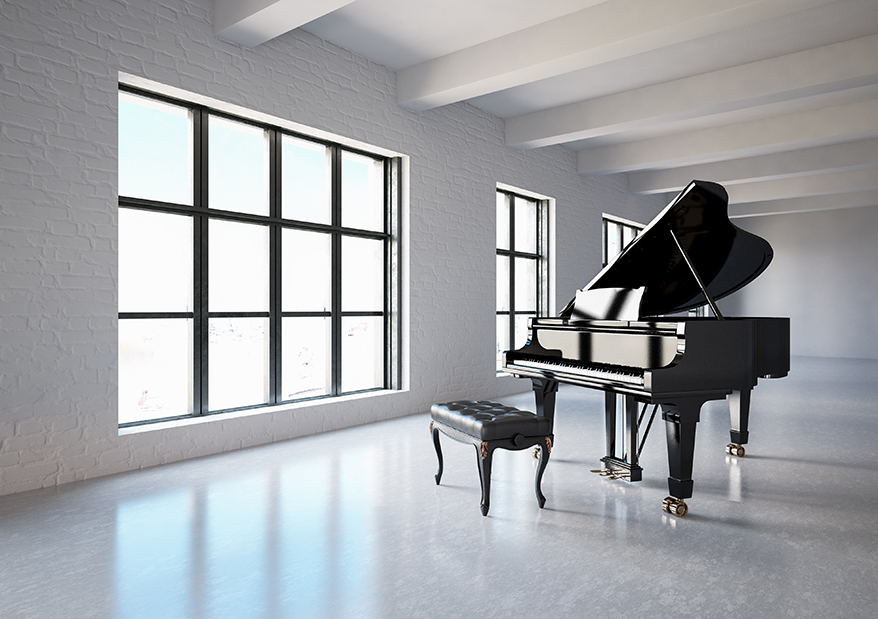 Black piano at the centre of the room ready to be moved in Toronto